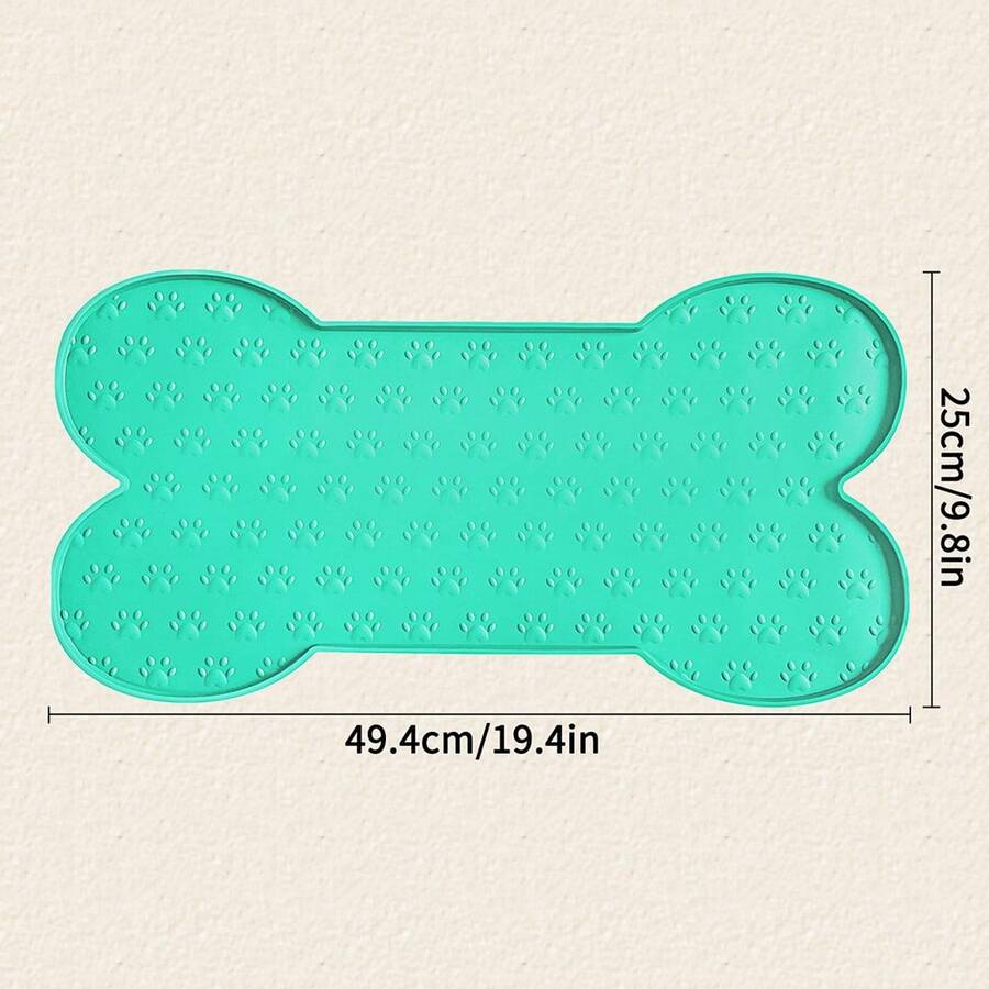 Multicolor bone-shaped silicone pet feeding mat with high spill-proof edge for cat and dog food and water bowls.