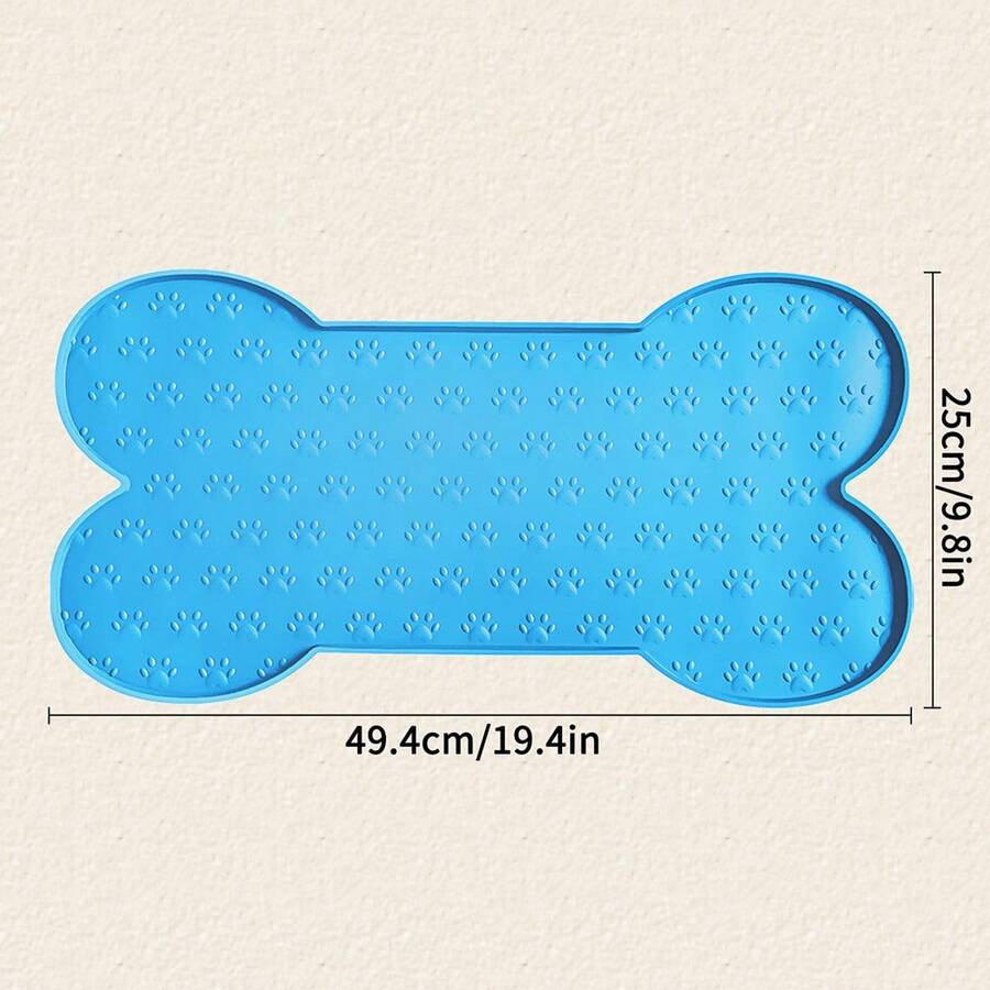 Multicolor bone-shaped silicone pet feeding mat with high spill-proof edge for cat and dog food and water bowls.