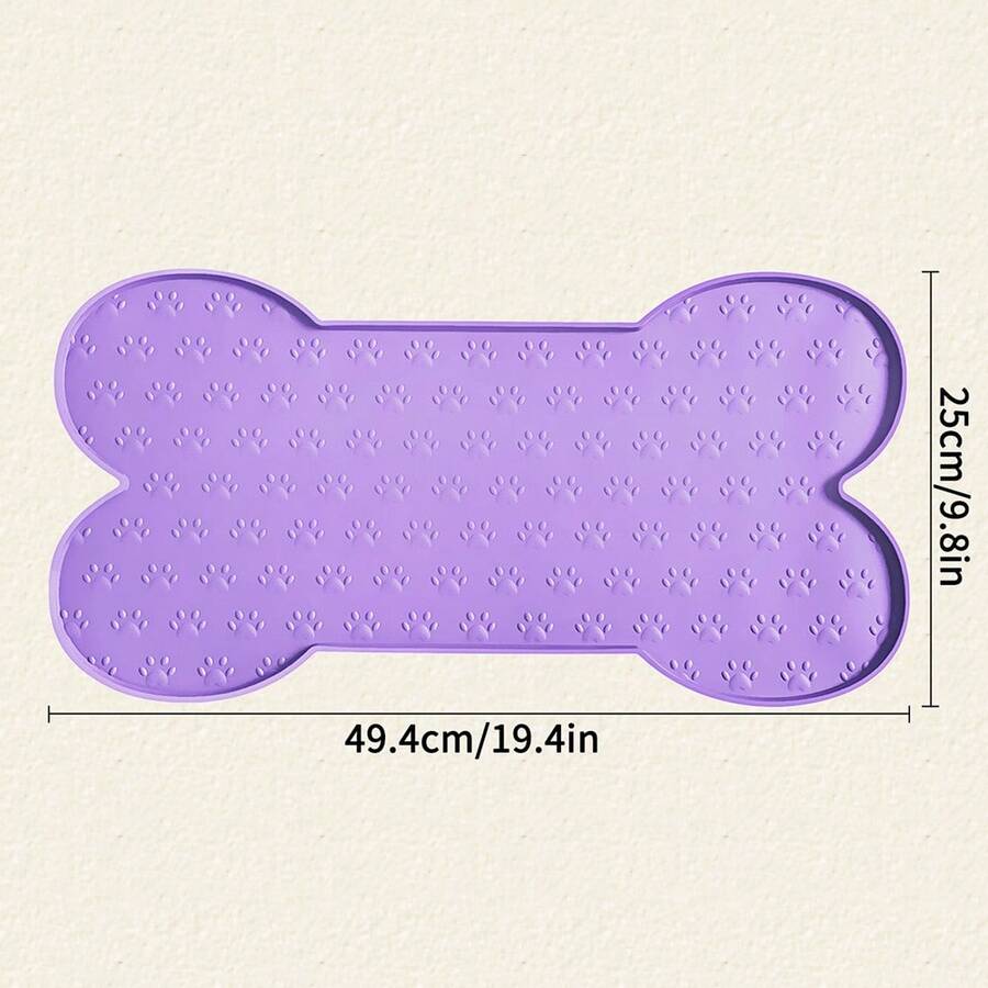Multicolor bone-shaped silicone pet feeding mat with high spill-proof edge for cat and dog food and water bowls.