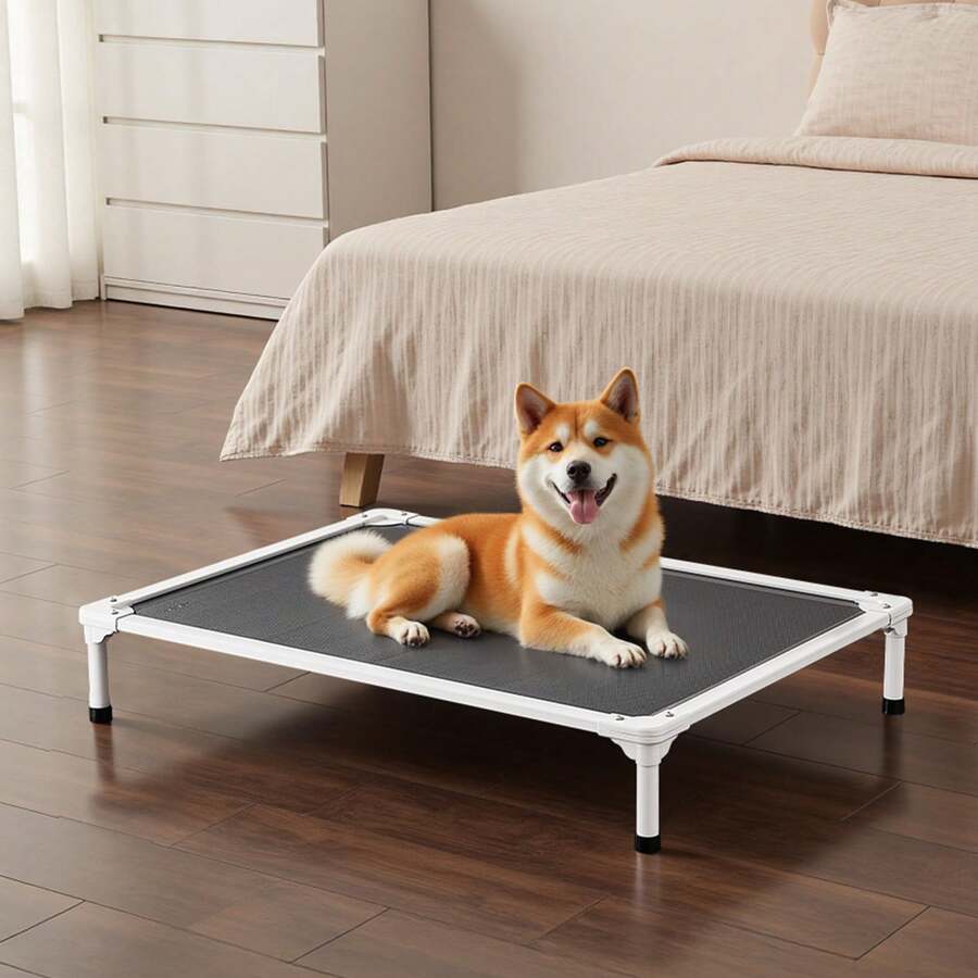 Elevated dog bed for large dogs featuring gray breathable Teslin mesh and a durable metal frame for indoor and outdoor cooling.