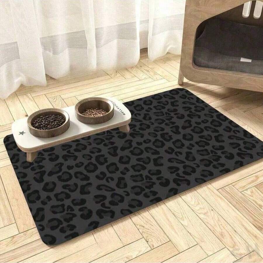 Black leopard print pet feeding mat with water-absorbent top surface and non-slip rubber bottom for cats and dogs