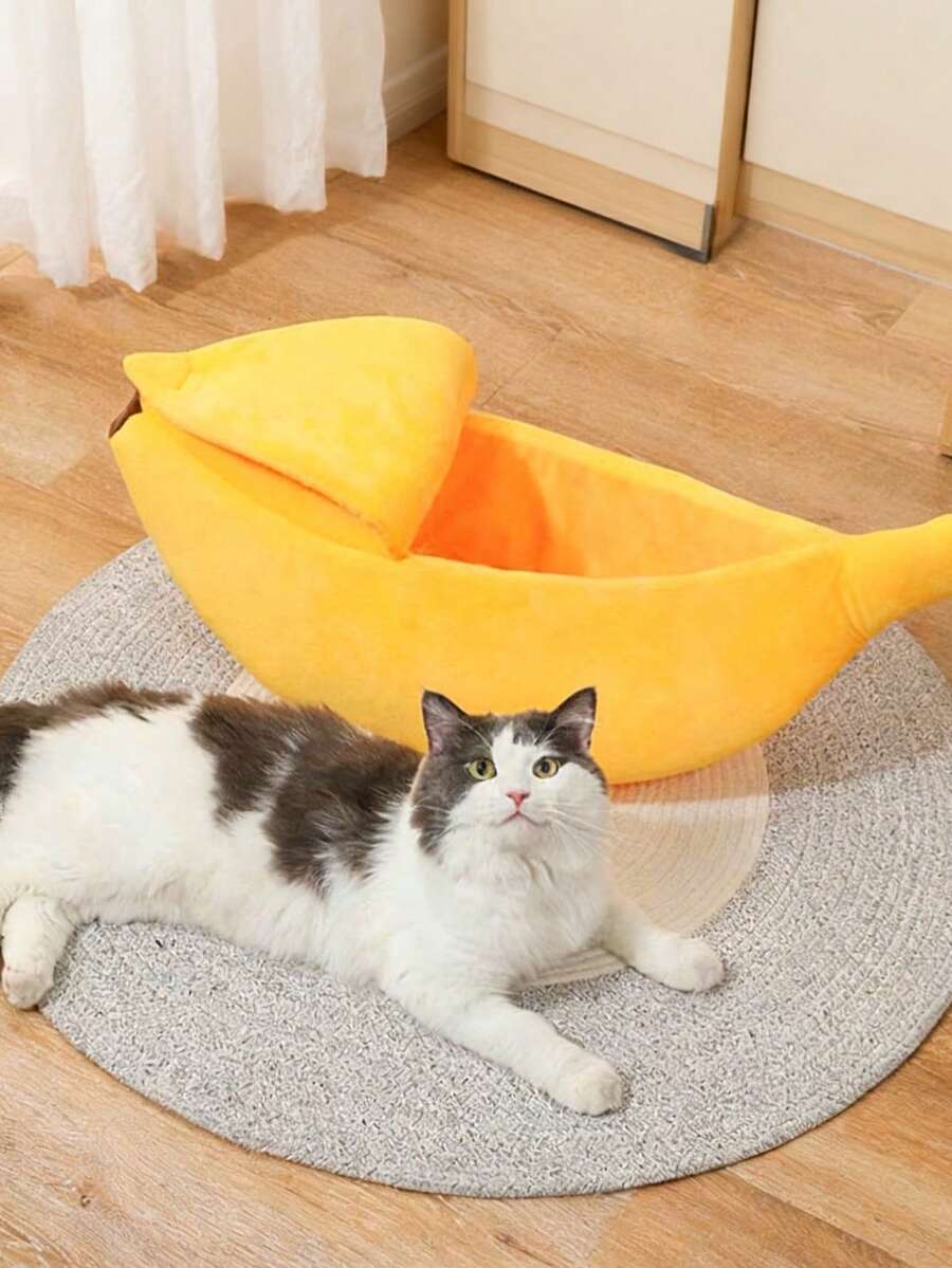 Yellow banana shaped warm pet bed with a covered lid for indoor cats and small dogs