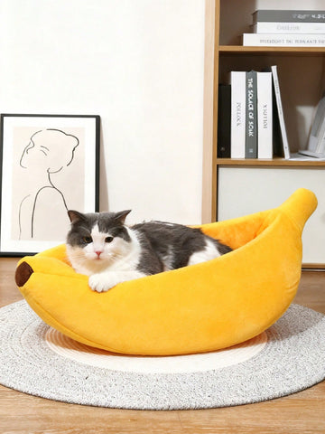 Yellow banana shaped warm pet bed with a covered lid for indoor cats and small dogs