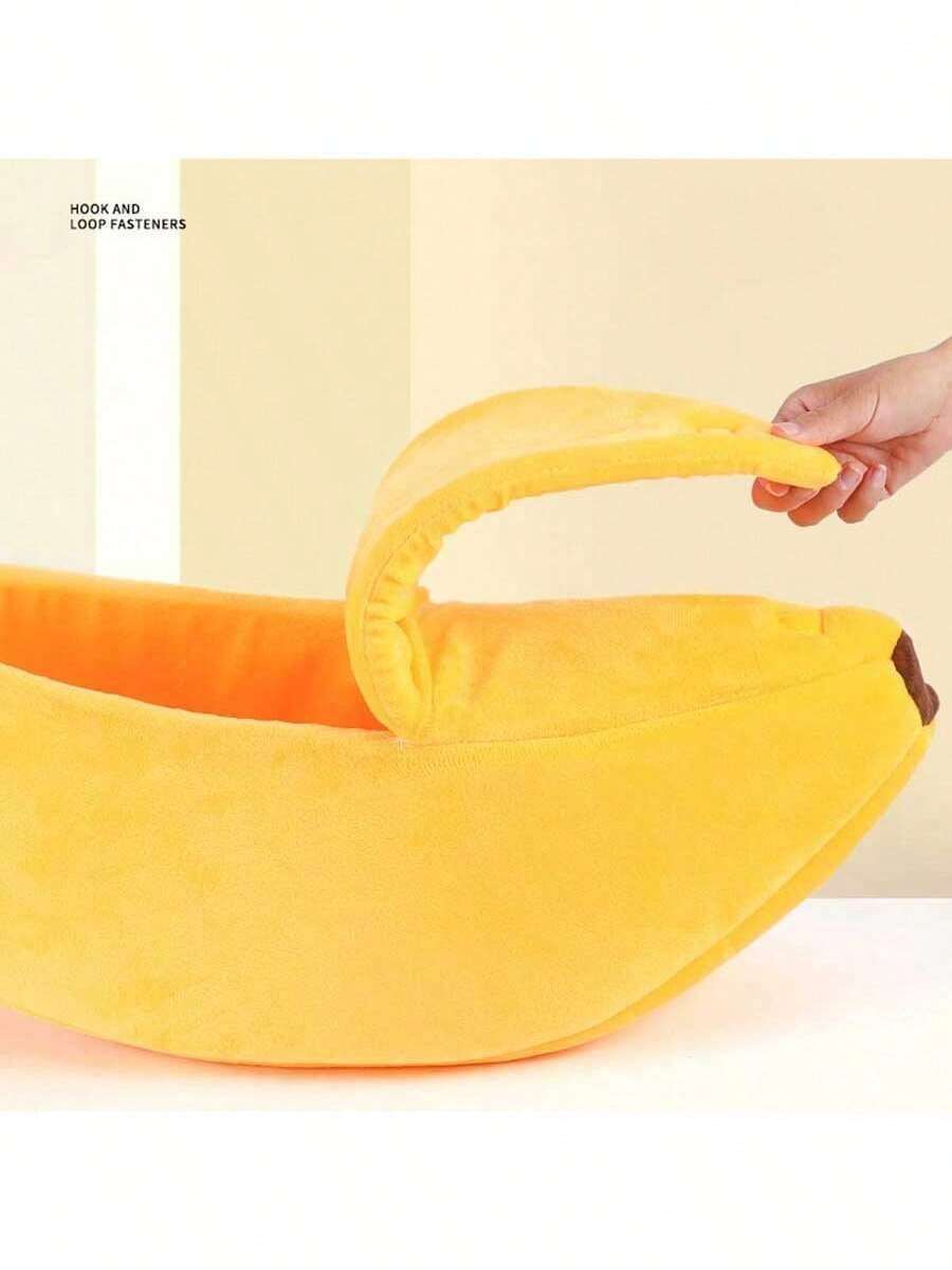Yellow banana shaped warm pet bed with a covered lid for indoor cats and small dogs