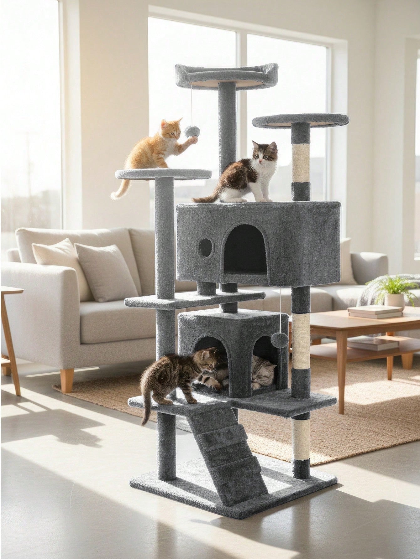 Dark gray 54-inch multi-level cat tree tower featuring 3 top perches, 2 cozy condos, scratching posts, and hanging toys for indoor cats.