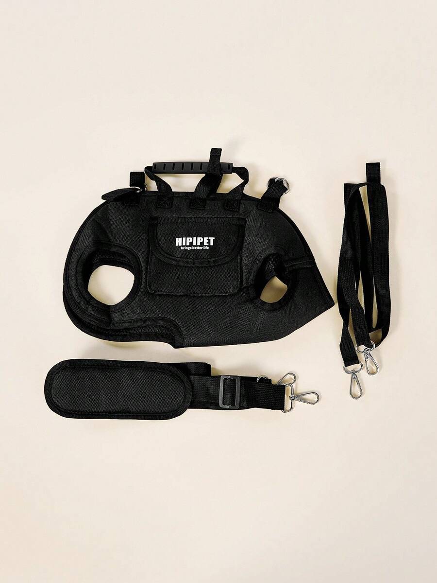 Black breathable dog backpack with adjustable straps for carrying pets in crossbody or shoulder style