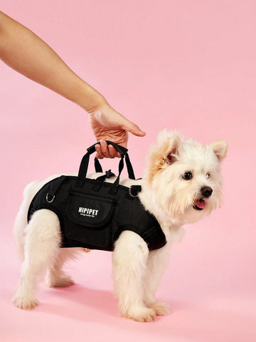 Black breathable dog backpack with adjustable straps for carrying pets in crossbody or shoulder style