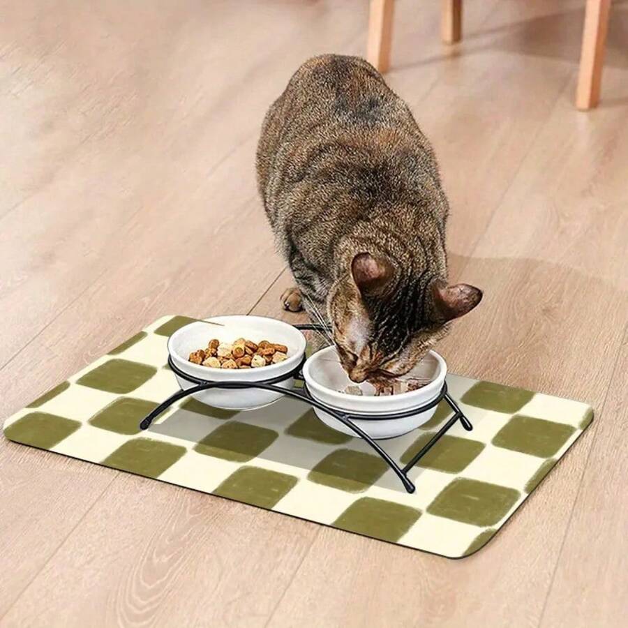 Multicolor plaid diatomite pet feeding mat placed under food and water bowls for dogs and cats.