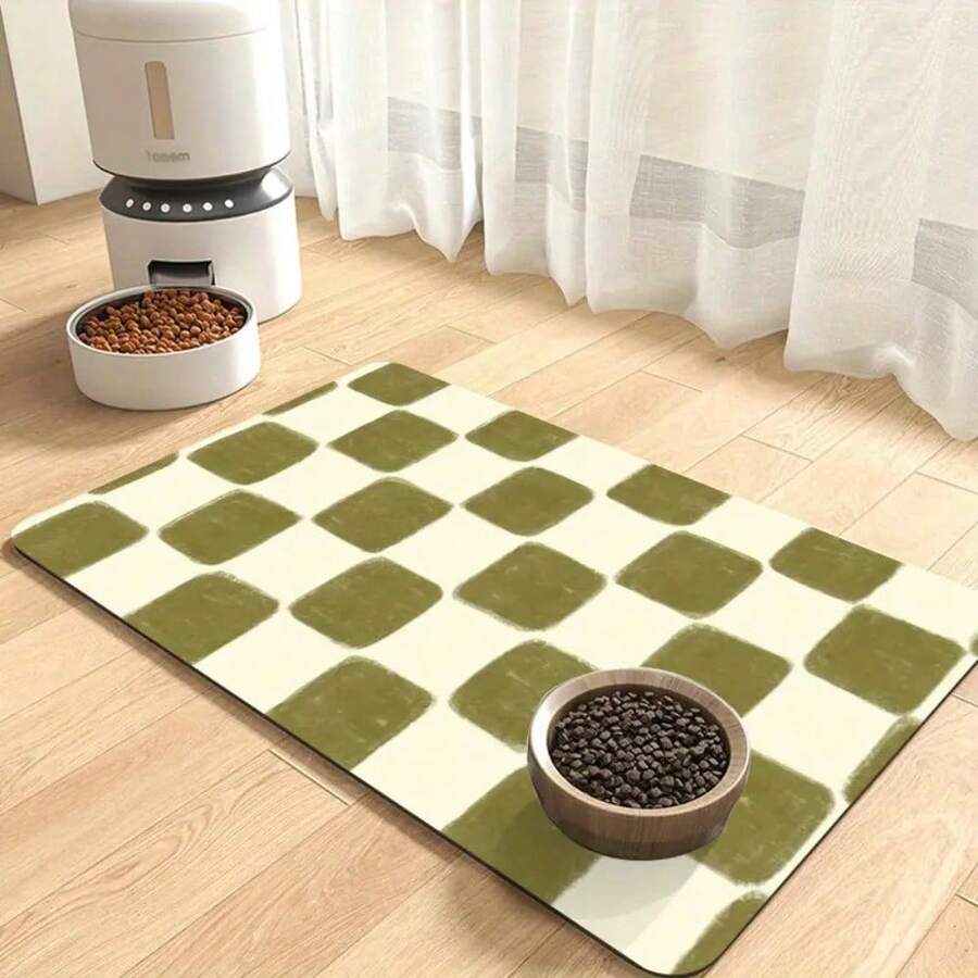 Multicolor plaid diatomite pet feeding mat placed under food and water bowls for dogs and cats.