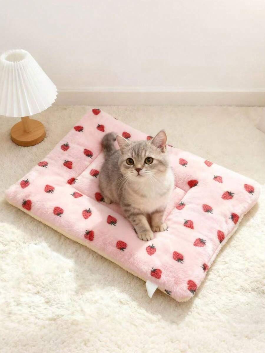 Multicolor soft strawberry print pet sleeping mat for cats and dogs made from 100% polyester with plush filling.