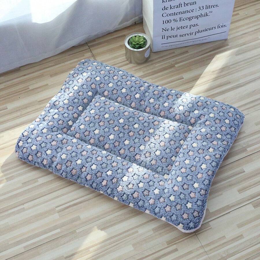 Multicolor soft strawberry print pet sleeping mat for cats and dogs made from 100% polyester with plush filling.