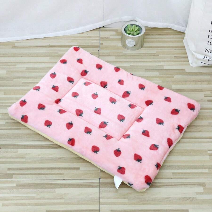 Multicolor soft strawberry print pet sleeping mat for cats and dogs made from 100% polyester with plush filling.