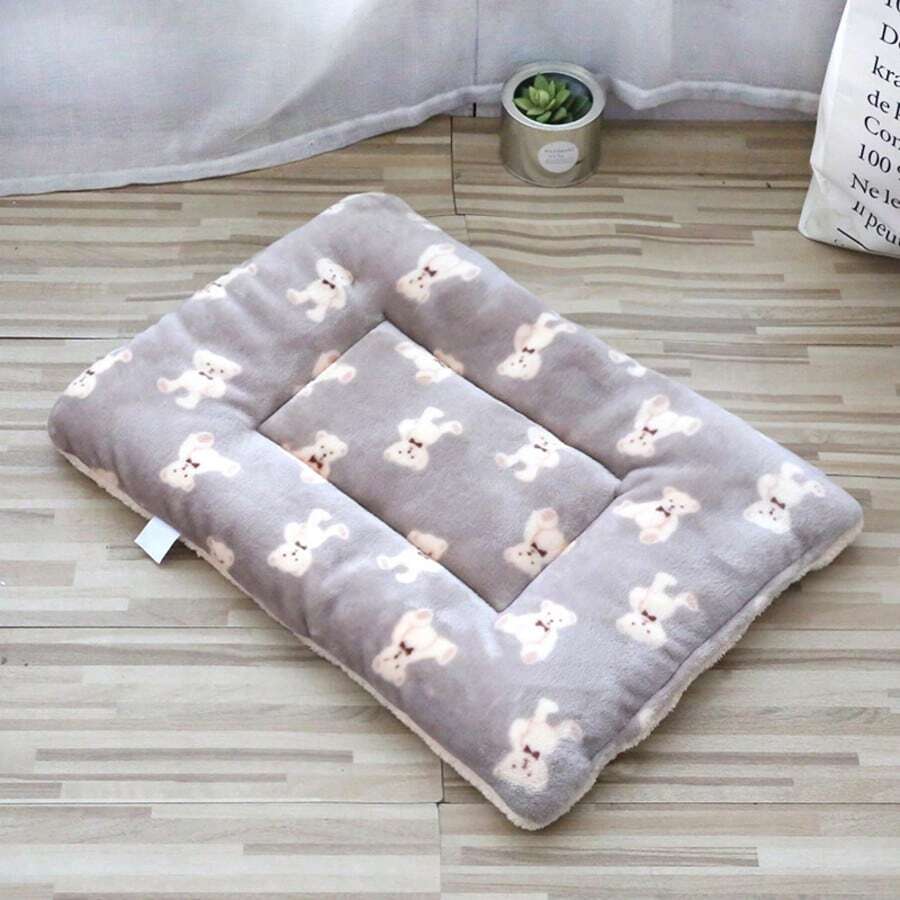 Multicolor soft strawberry print pet sleeping mat for cats and dogs made from 100% polyester with plush filling.