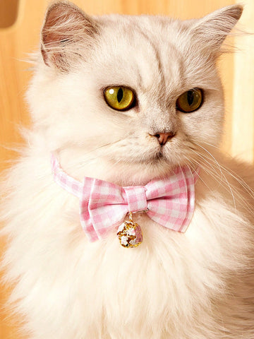 Pink plaid adjustable pet collar with pendant for cats and dogs, made from polyester with plated precious metal detailing.