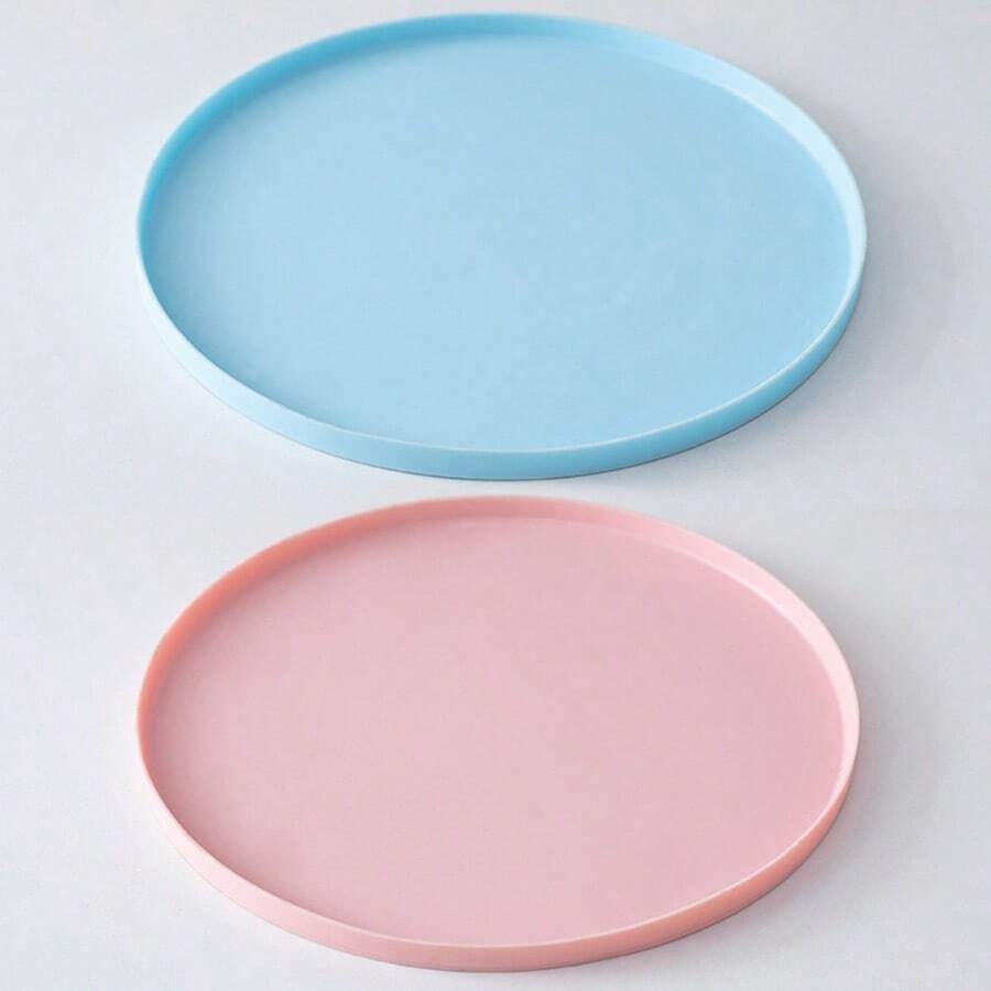 Round multicolor silicone pet food mat with raised edges for cats and dogs.