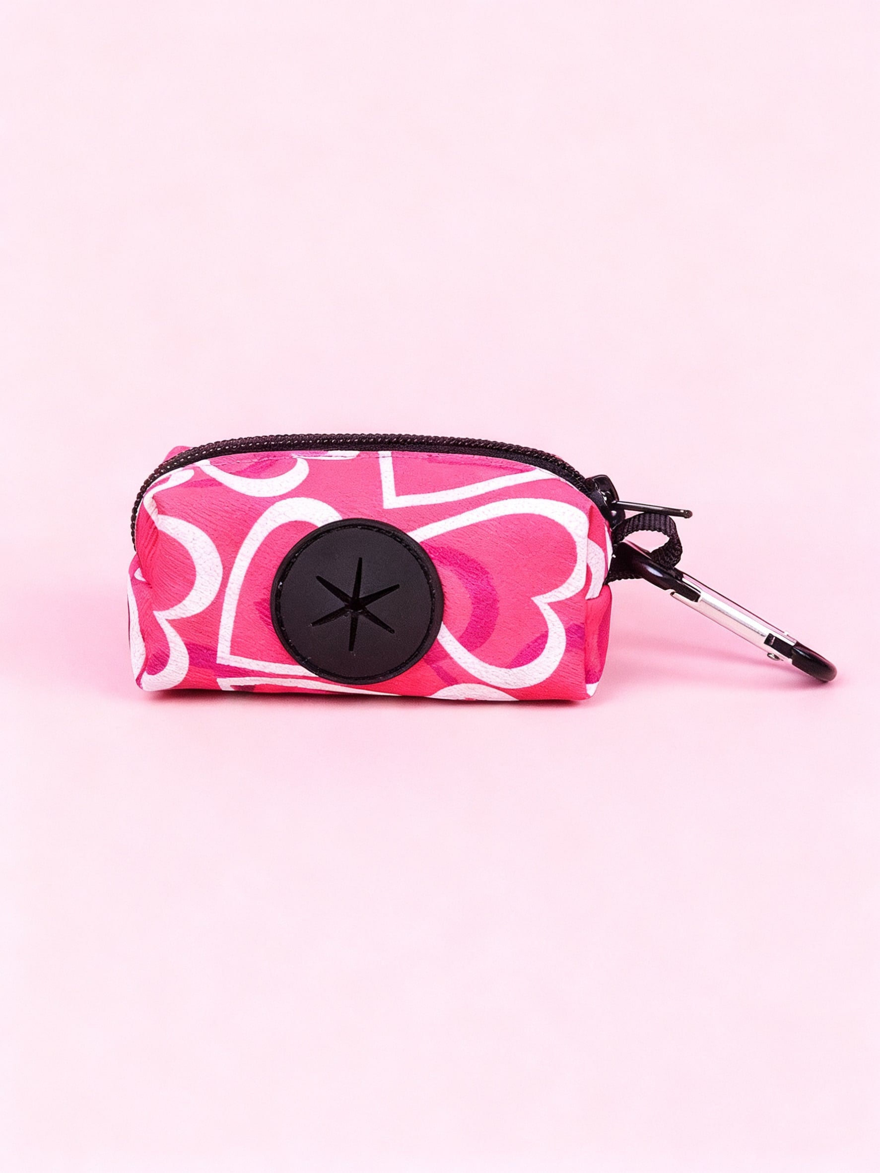 Hot pink heart print adjustable dog harness and leash set with matching poop bag holder for outdoor walking