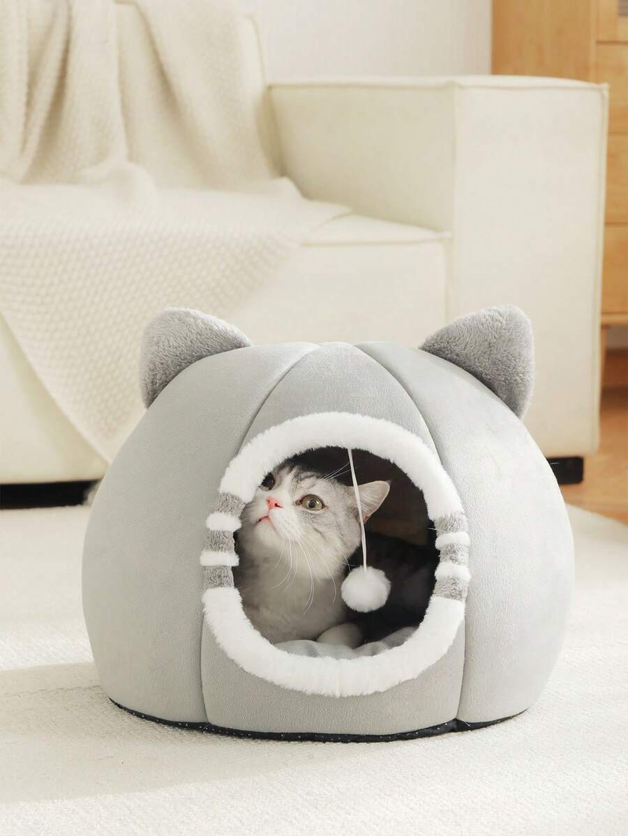 Grey washable cat bed made of soft polyester fabric with an anti-slip bottom for indoor cats and kittens.