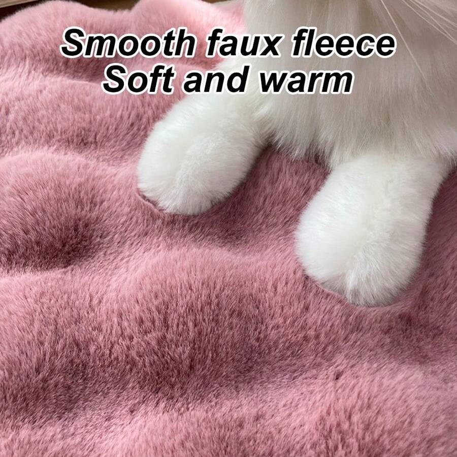Multicolor round pet sleeping pad made of soft 100% polyester fabric suitable for cats and small pets.