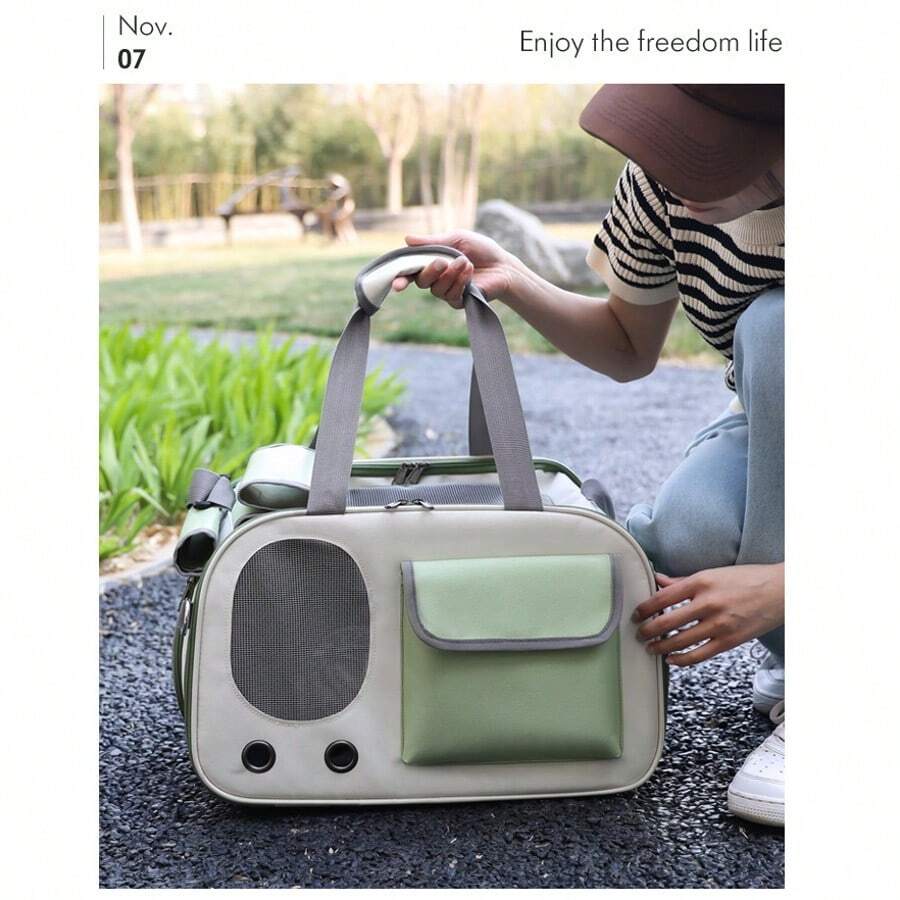 Beige and green breathable cat carrier backpack made of Oxford fabric with mesh ventilation holes and roll-up shade curtain for outdoor travel.