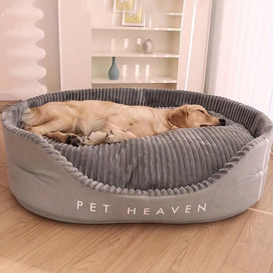 Grey washable round dog bed with dual-sided high and low side design filled with cotton for cats and dogs.