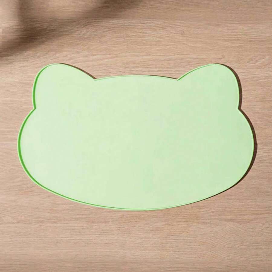 Multicolor silicone pet food mat with cartoon pattern, waterproof non-slip surface, and raised edges for dog and cat bowls.