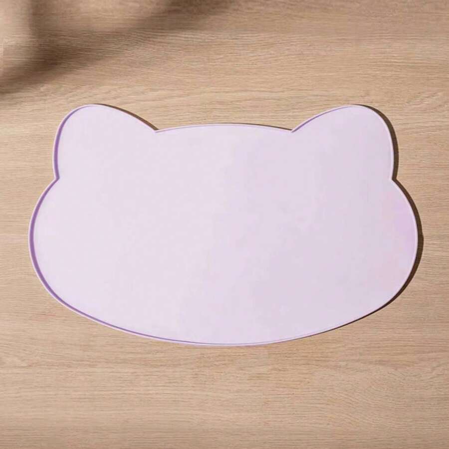 Multicolor silicone pet food mat with cartoon pattern, waterproof non-slip surface, and raised edges for dog and cat bowls.