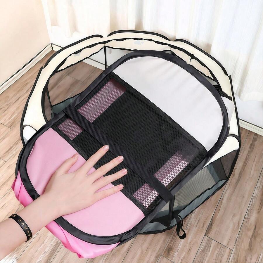 Dusty pink foldable octagonal pet tent kennel and playpen for cats and dogs made from 100% polyester.
