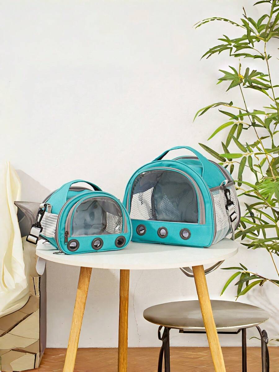 Multicolor portable pet carrier bag made of polyester oxford cloth for transporting small pets, cats, and dogs.