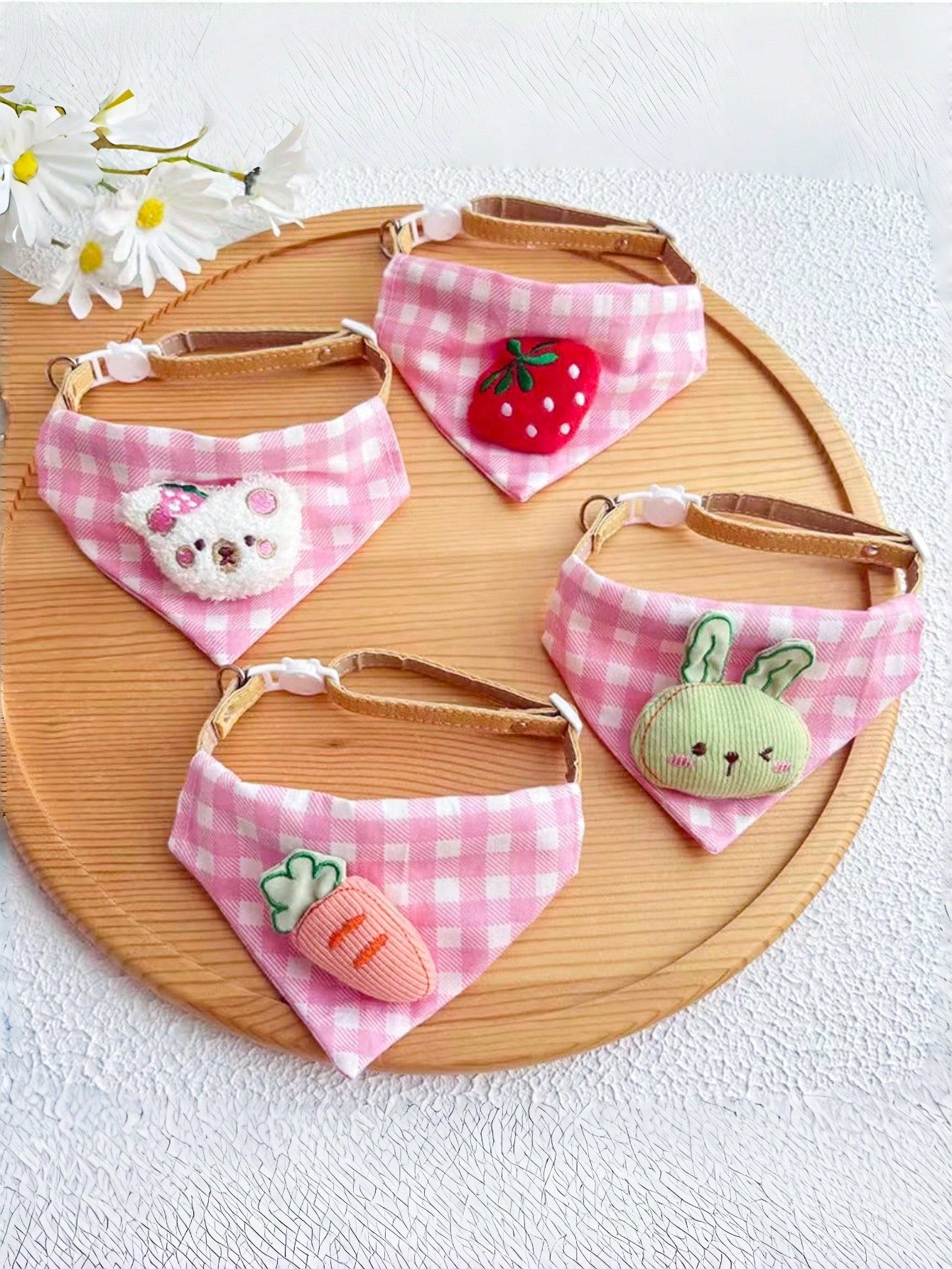 Multicolor polyester triangular pet bandana collar with cartoon design for cats and dogs, used as a cute drooling towel and pet accessory.