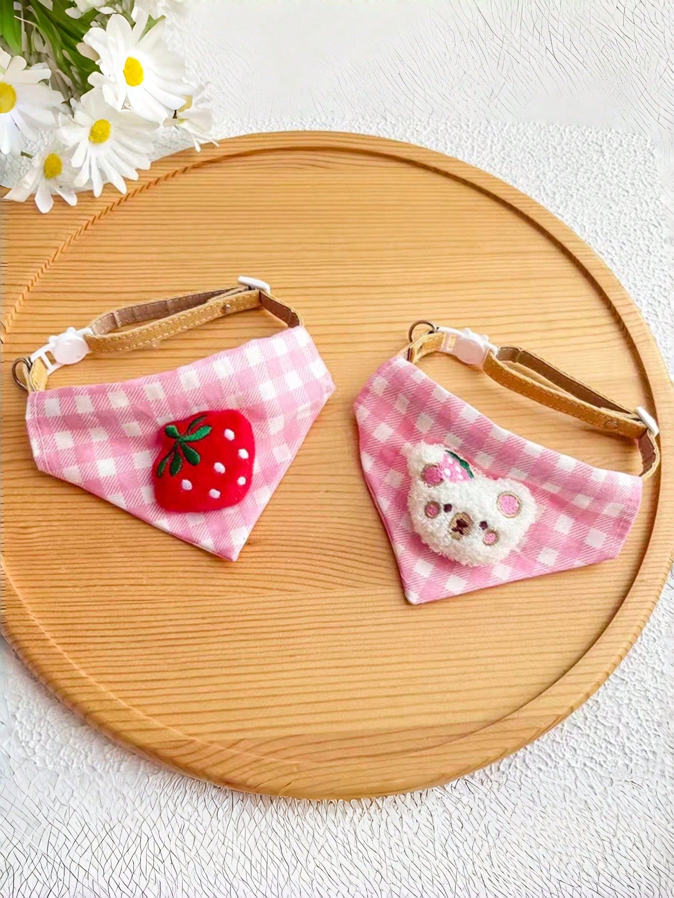 Multicolor polyester triangular pet bandana collar with cartoon design for cats and dogs, used as a cute drooling towel and pet accessory.