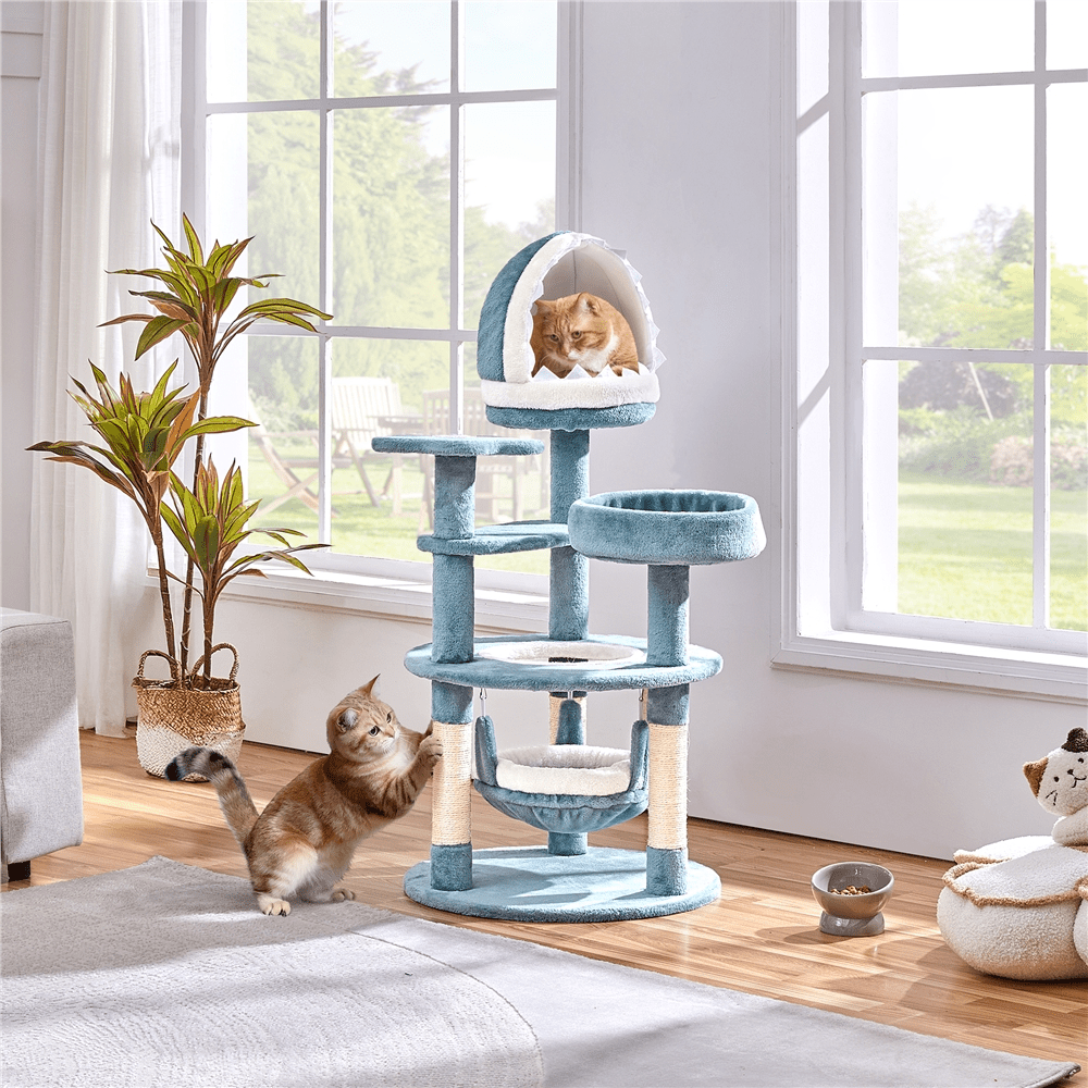Butterslay 45.5 inch multi-level ocean themed cat tree tower in blue and white featuring plush perches, sisal scratching posts, a shark mouth nest, and a hammock for indoor cats.