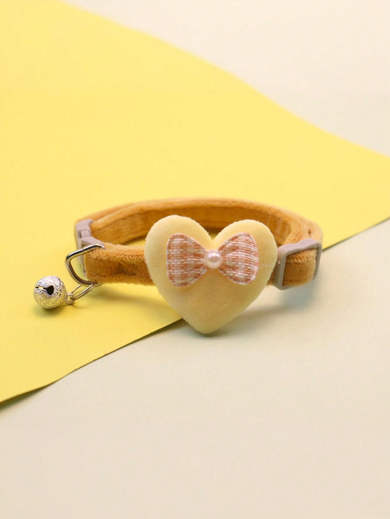 Multicolor adjustable polyester pet collar with cartoon heart-shaped bow decoration and bell pendant for small and medium cats and dogs.