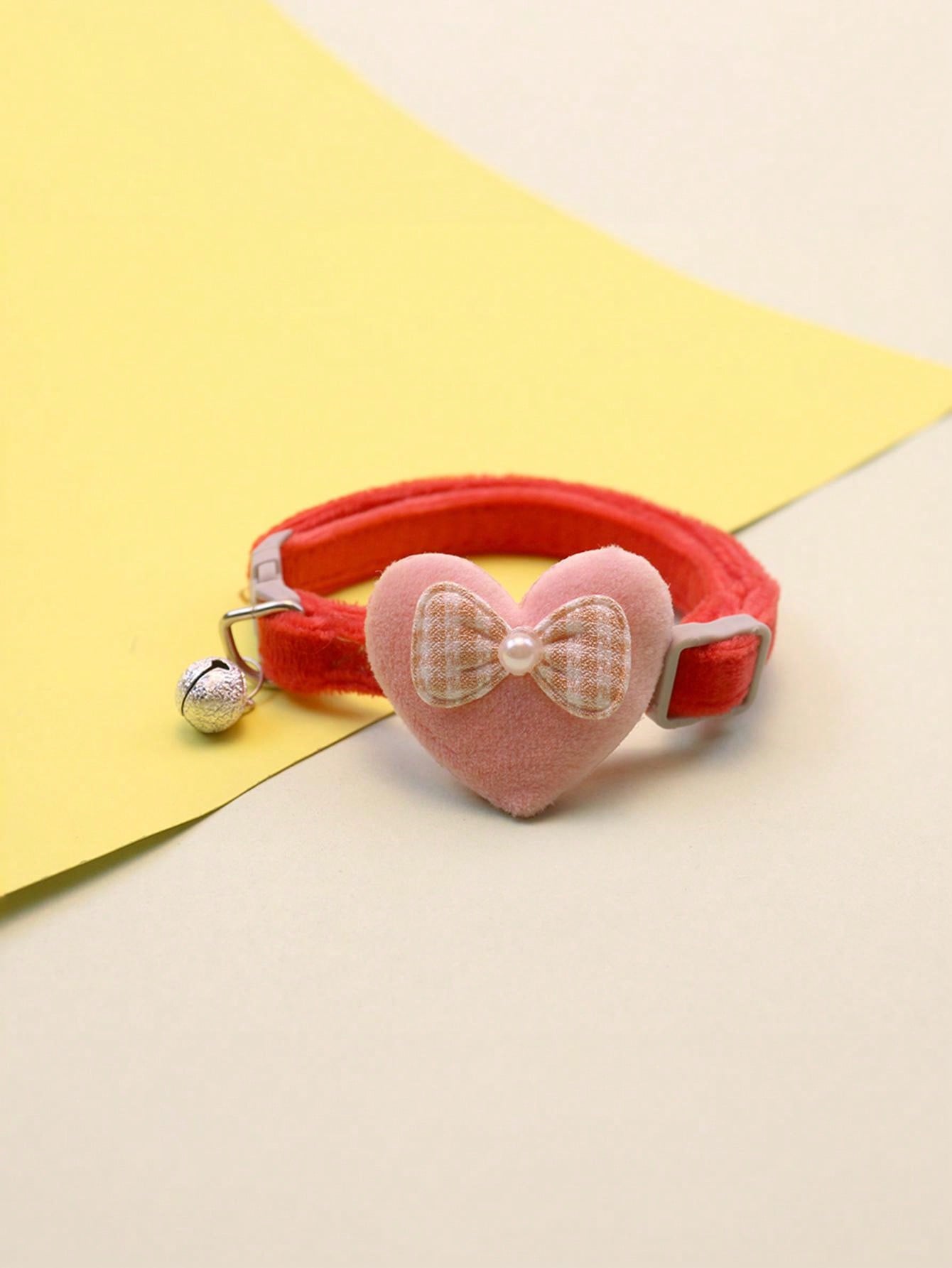 Multicolor adjustable polyester pet collar with cartoon heart-shaped bow decoration and bell pendant for small and medium cats and dogs.