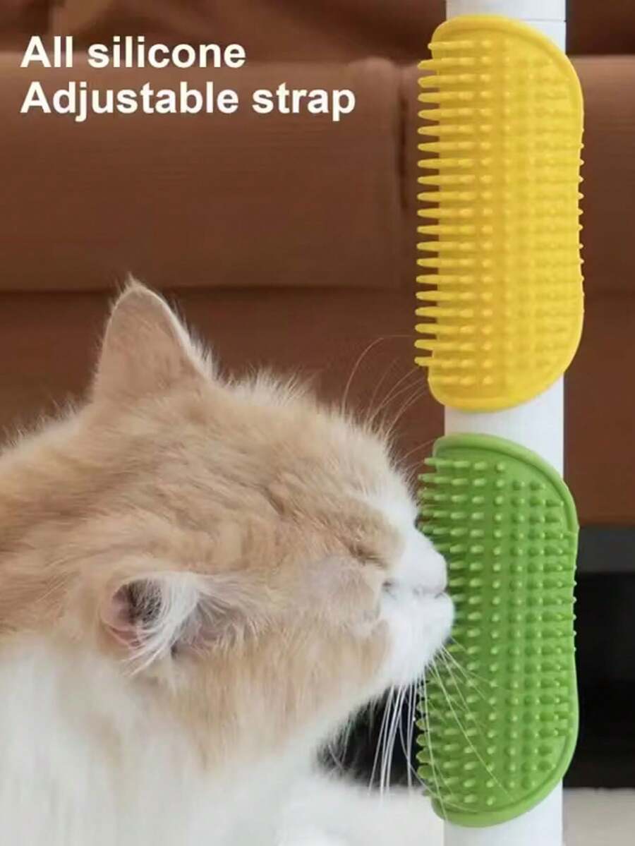 Silicone cat scratching brush with adjustable strap attached to a table leg for cat self-grooming.