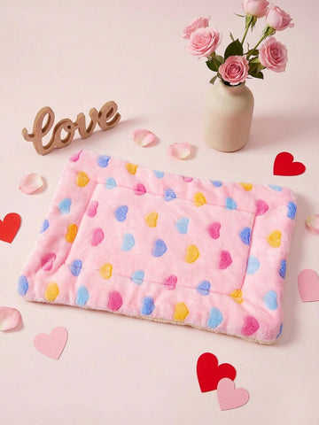 Pink heart-shaped warm pet bed featuring a geometric pattern for cats and small dogs.
