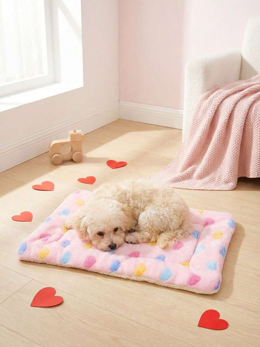 Pink heart-shaped warm pet bed featuring a geometric pattern for cats and small dogs.