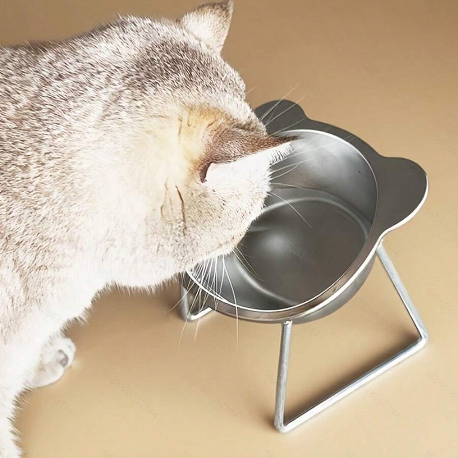 Elevated stainless steel cat bowl featuring cat ears detail, an inclined neck protection design, and a wide stable base.