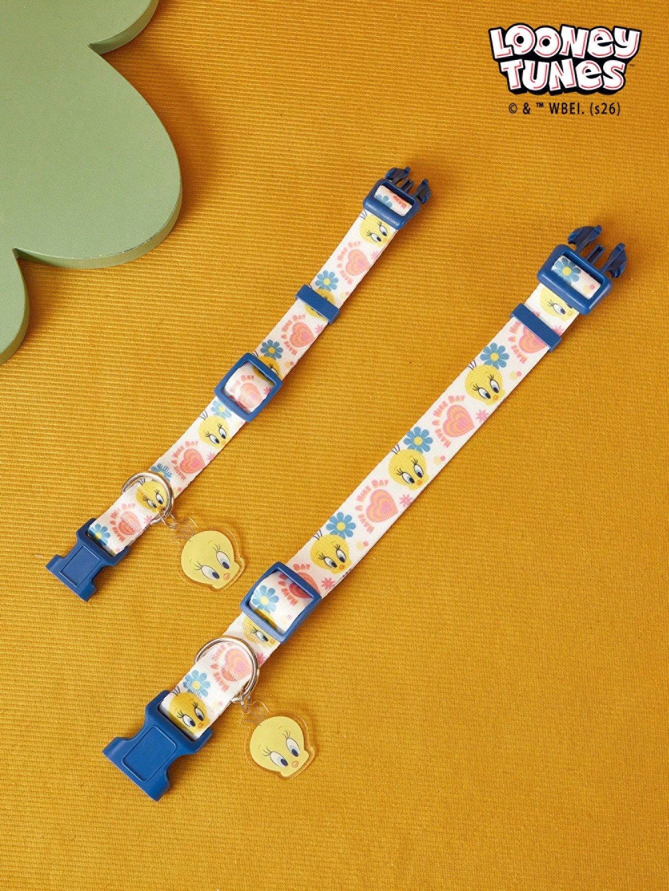 Blue adjustable polyamide dog collar with cartoon flower print for small and medium dogs, suitable for walking, training, and everyday wear.