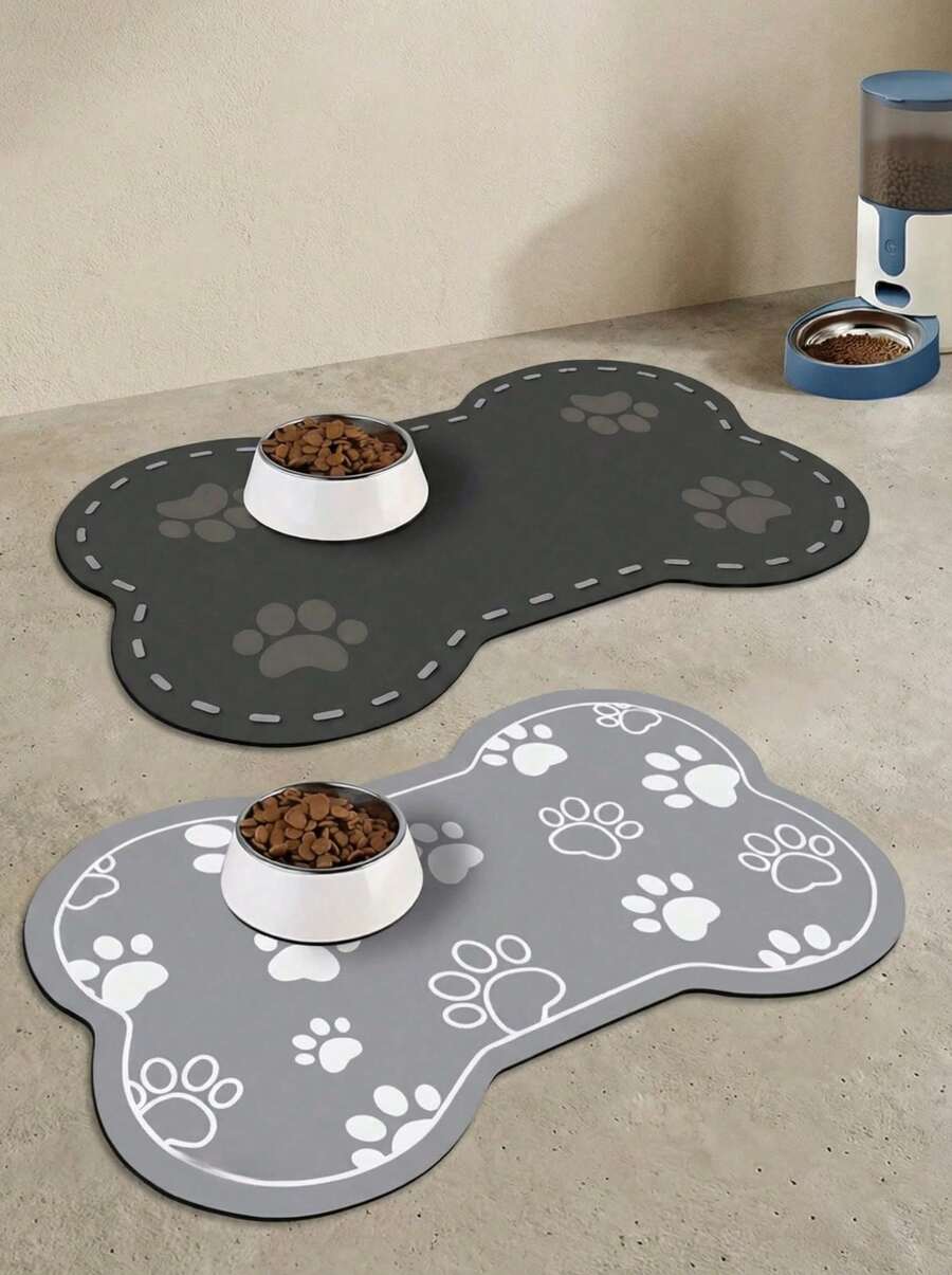 Multicolor cartoon diatomite pet feeding mat with cute paw print design for cats and dogs.