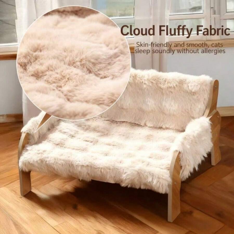 Elevated wooden pet sofa bed featuring a brown memory foam cushion with a removable washable cover, designed for cats and dogs.