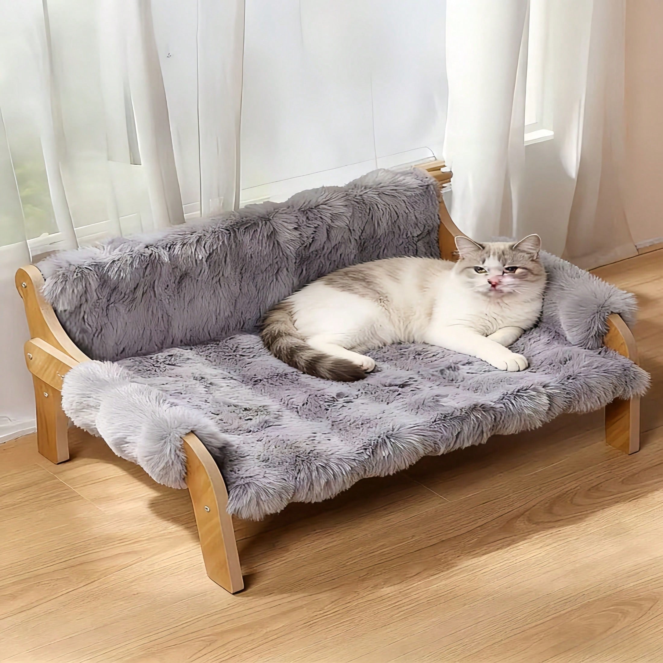 Elevated wooden pet sofa bed featuring a brown memory foam cushion with a removable washable cover, designed for cats and dogs.