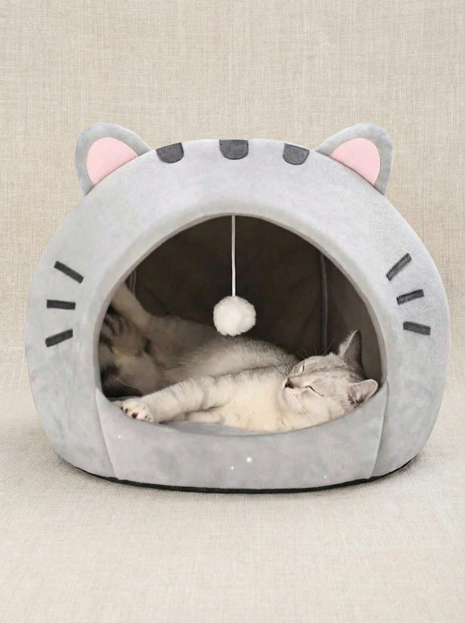 Multicolor soft cat bed sleeping basket with cartoon pattern fabric and polyester cushion filling for cats and dogs.