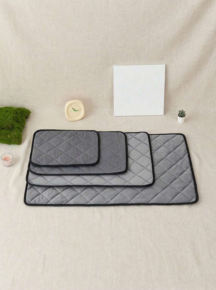 Multicolor self-heating pet mat thermal insulation cushion for cats and dogs made of polyester material.