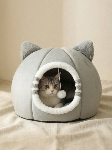 Grey washable cat bed made of soft polyester fabric with an anti-slip bottom for indoor cats and kittens.