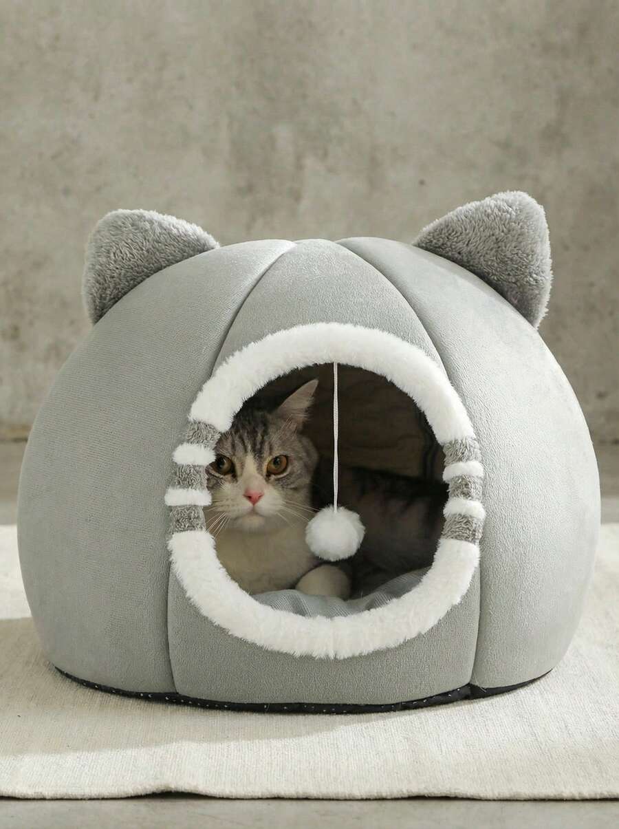 Grey washable cat bed made of soft polyester fabric with an anti-slip bottom for indoor cats and kittens.