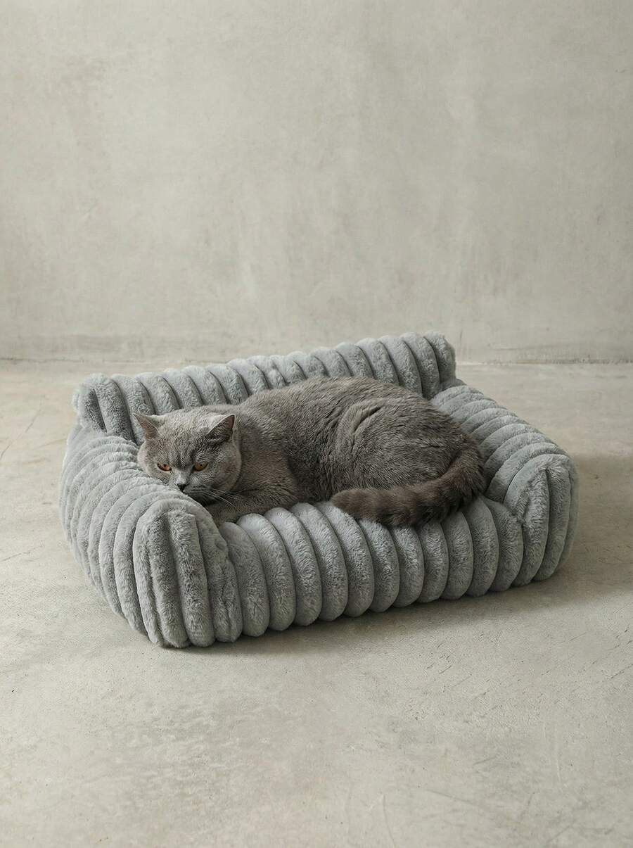 Grey soft fabric cat bed sofa with polyester filling, designed for all-season cat sleeping and resting.