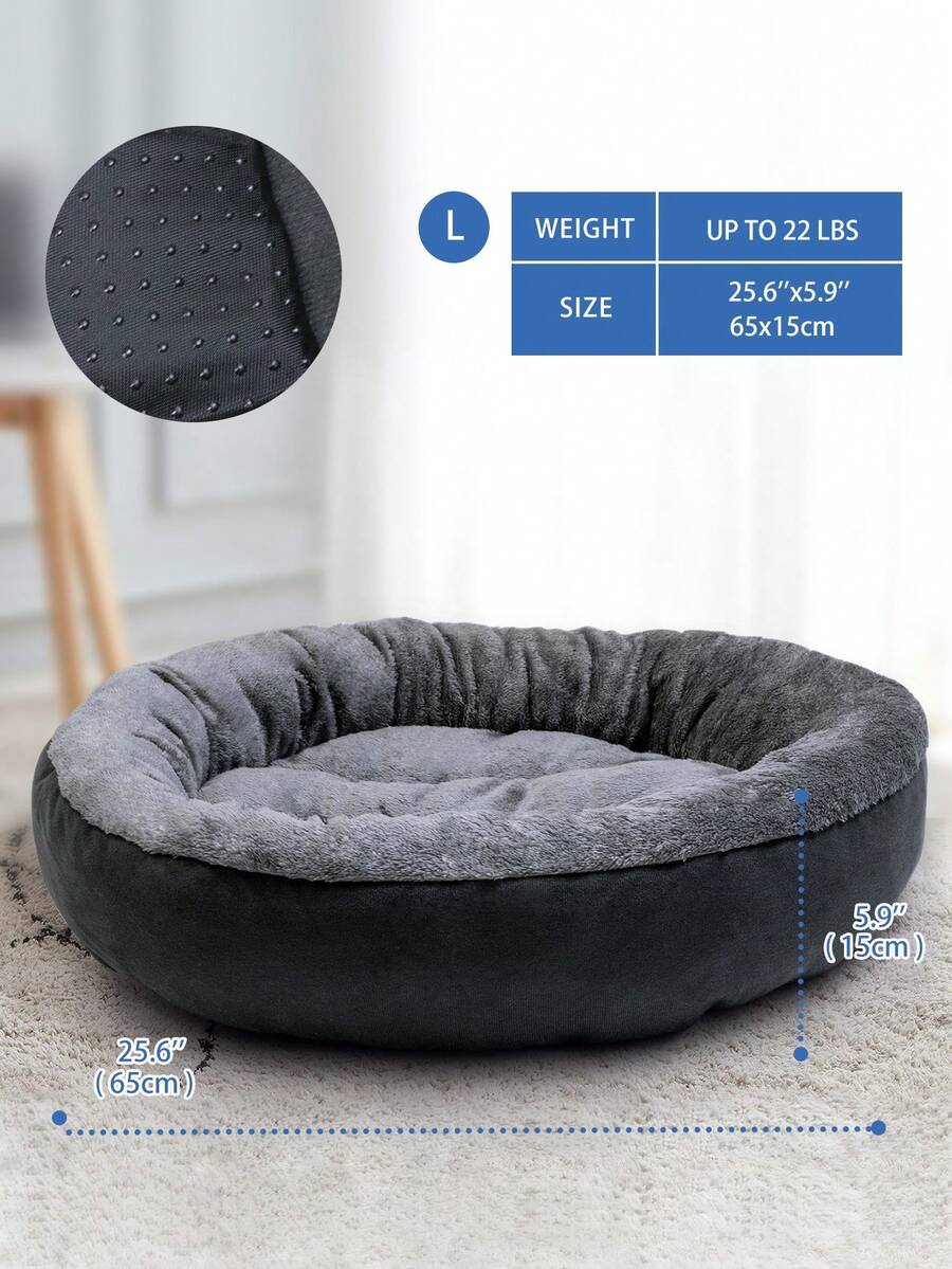 Dark grey plush donut calming pet bed for cats and dogs featuring a soft round design and non-slip bottom.