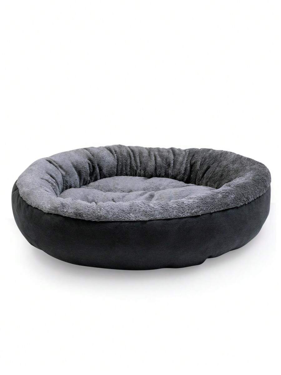 Dark grey plush donut calming pet bed for cats and dogs featuring a soft round design and non-slip bottom.