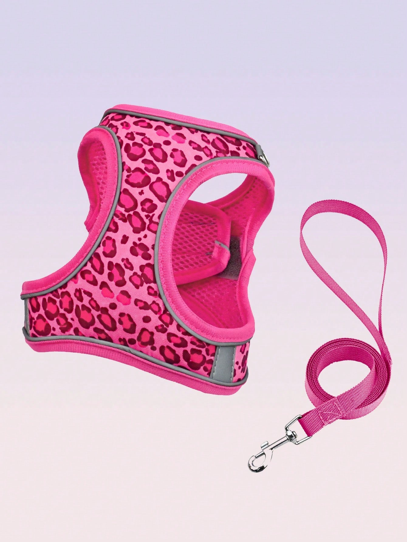 Leopard print cat and dog harness leash set made of breathable polyester mesh with adjustable fit and reflective stripes for small to medium pets