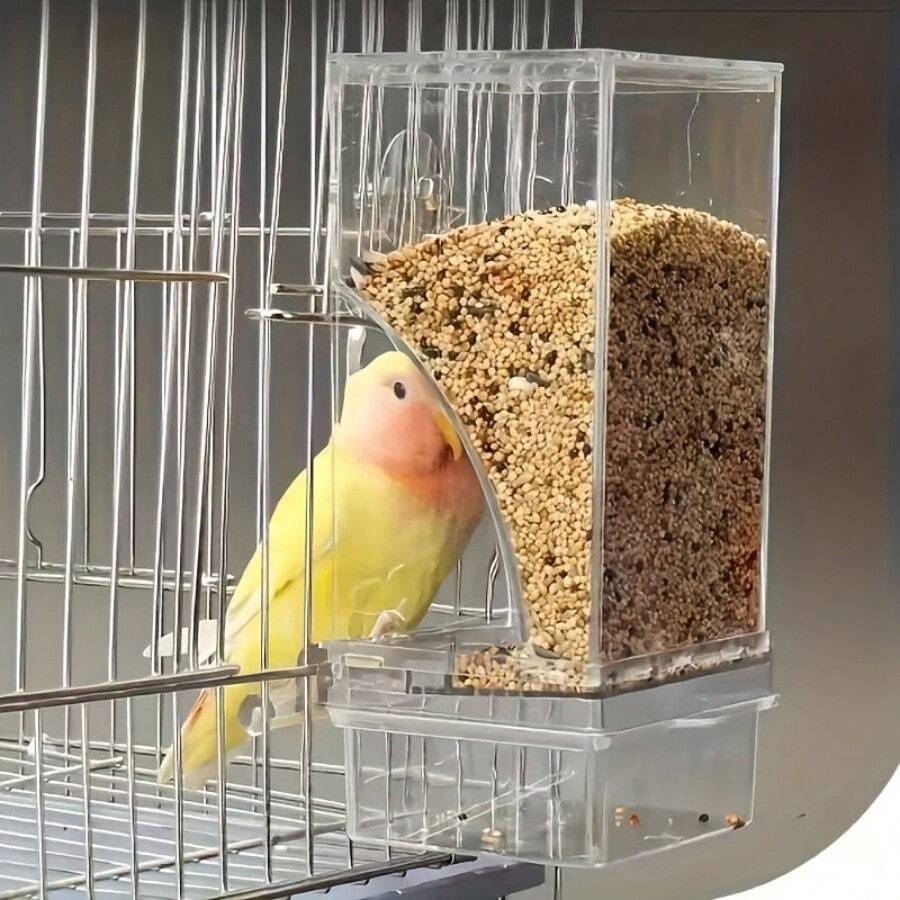 Transparent 1L automatic bird feeder with splash-proof design made of ABS for pet birds.